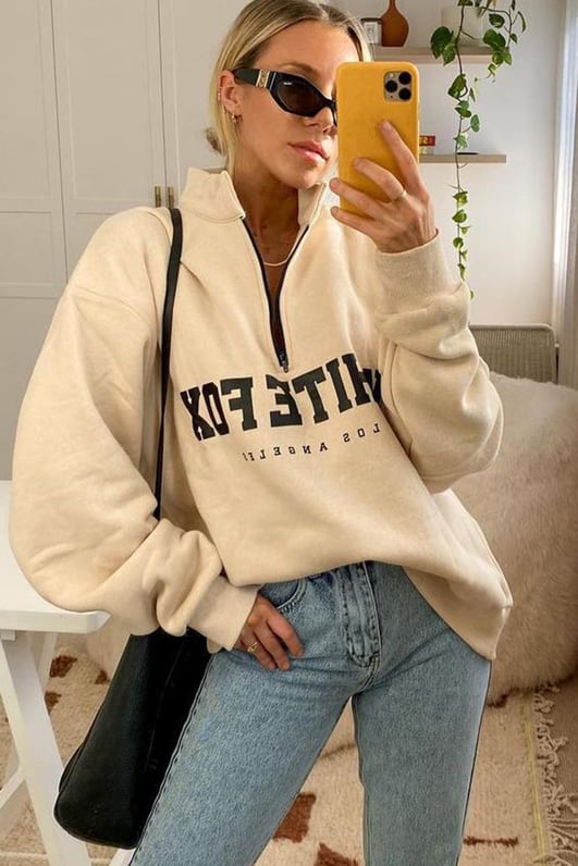 DIMI Fashion Customer Review Picture from the Summer Collection 2024 with a beige Half-Zip-Sweater from Jana C.