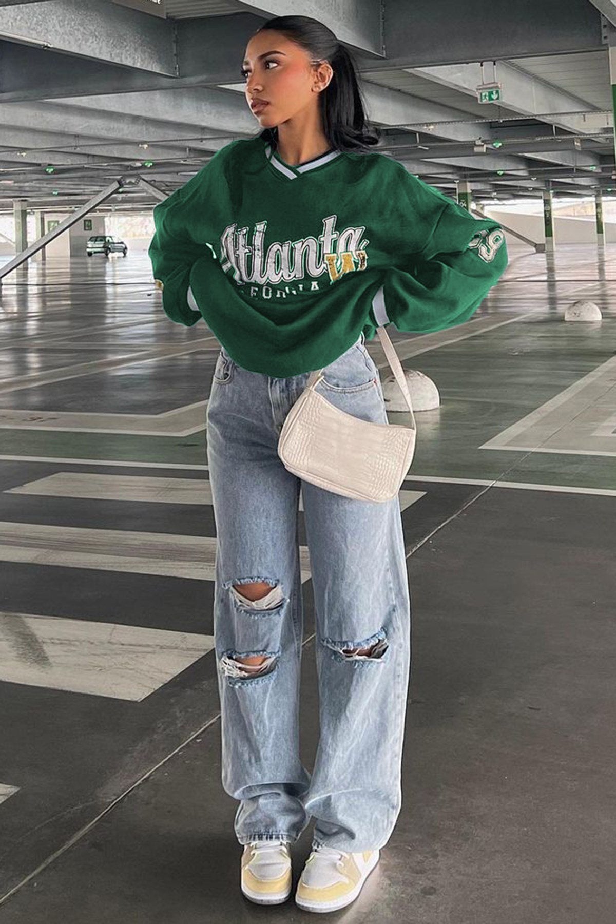 DIMI Summer Collection Customer Review Picture with a Green Atlanta Sweater